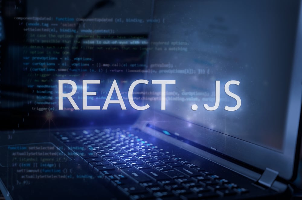 React,.js,Inscription,Against,Laptop,And,Code,Background.,Learn,React