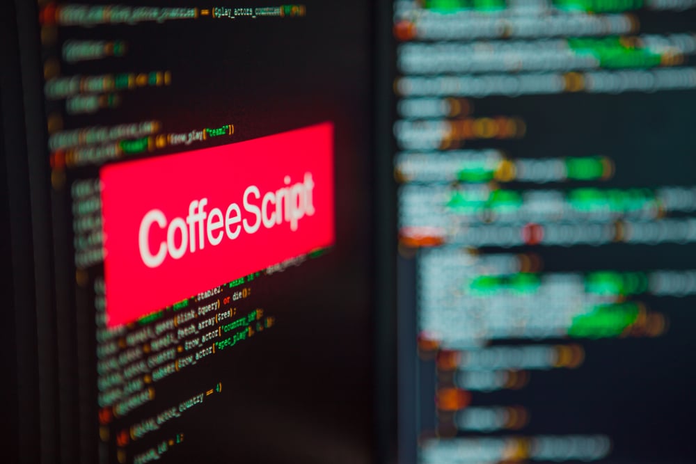 Programming,Language,,Coffeescript,Inscription,On,The,Background,Of,Computer,Code.