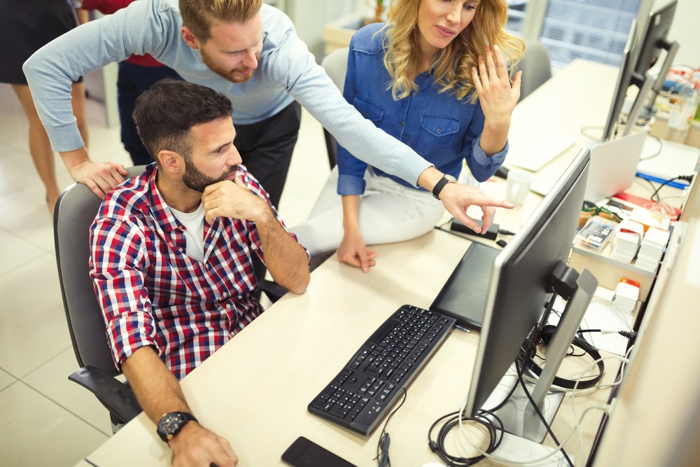 Programmers,Cooperating,At,It,Company,Developing,Apps devops vs sre